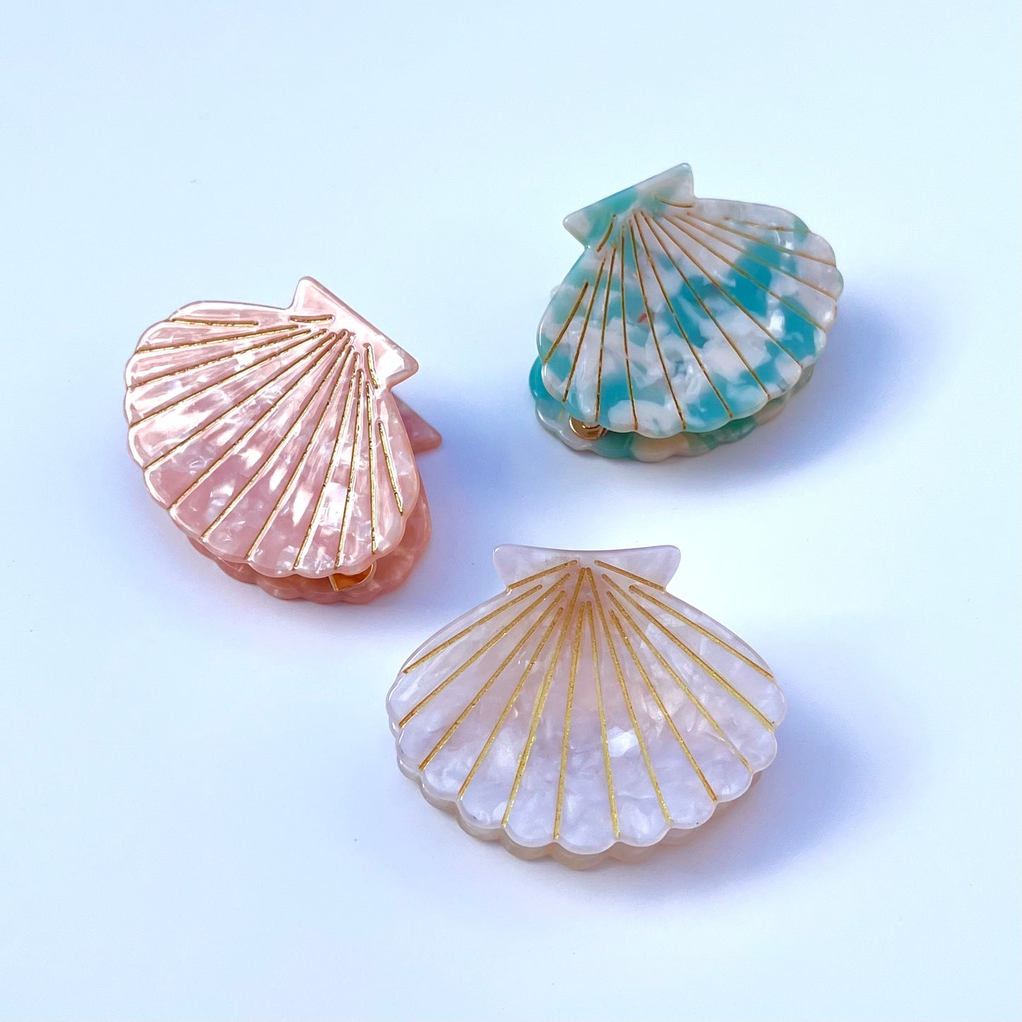 . Coralie Luxe Shell Claws .
