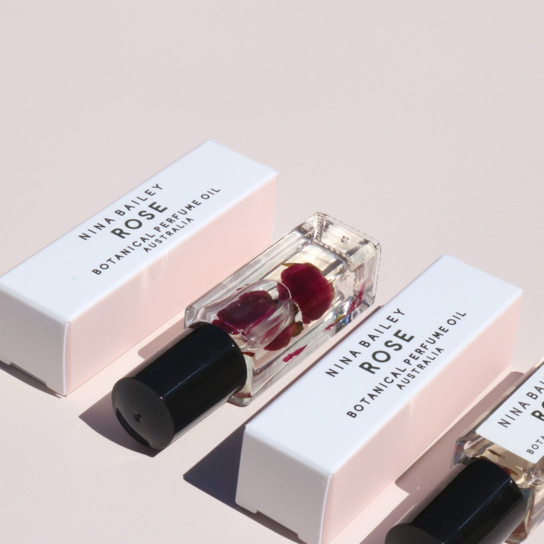 . Nina Bailey Perfume Rollers .